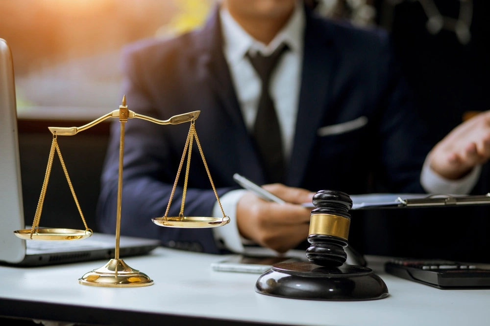An image depicting an experienced car accident attorney discussing a case.