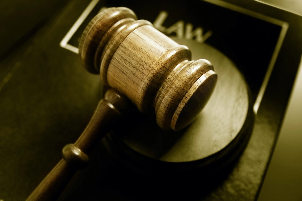 Snapshot of a gavel, representing the trust Webster Groves clients place in The Dixon Injury Firm for strong legal advocacy.