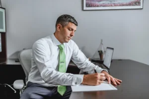 Snapshot of Chris Dixon in his office, highlighting trusted St. Louis car accident lawyers and the availability of a free consultation today.