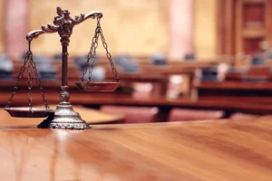 Snapshot of the scales of law and justice, illustrating Missouri laws governing subrogation in personal injury cases.